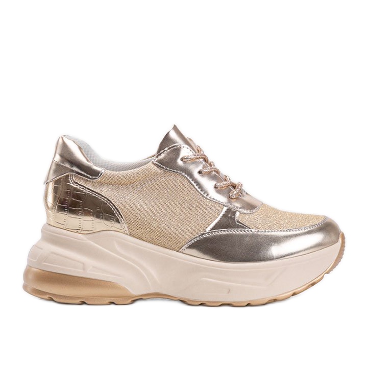 Zlatne tenisice s debelim Amynim potplatima zlatna