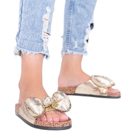 Zlatne papuče s Norrisovom mašnom zlatni