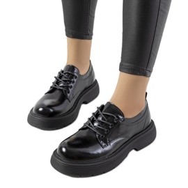 Crne hlače na vezanje na Henris platformi crna