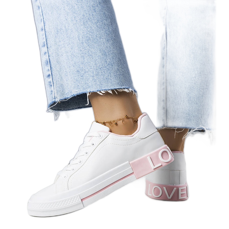 Bijelo roze tenisice ukrašene natpisom Nora bijela