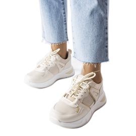 Bež tenisice od više tkanina marke Caya