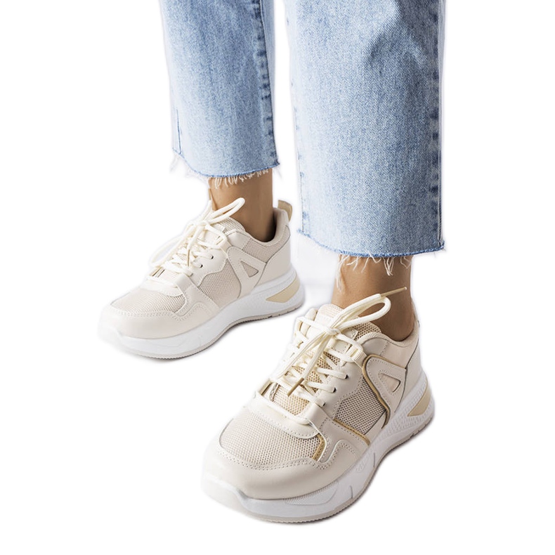 Bež tenisice od više tkanina marke Caya