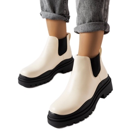 Bež čizme na crnoj platformi marke Marinone