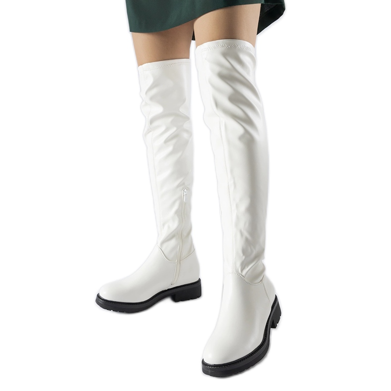 Bijele duge čizme s tamnim Sisson potplatom bijela