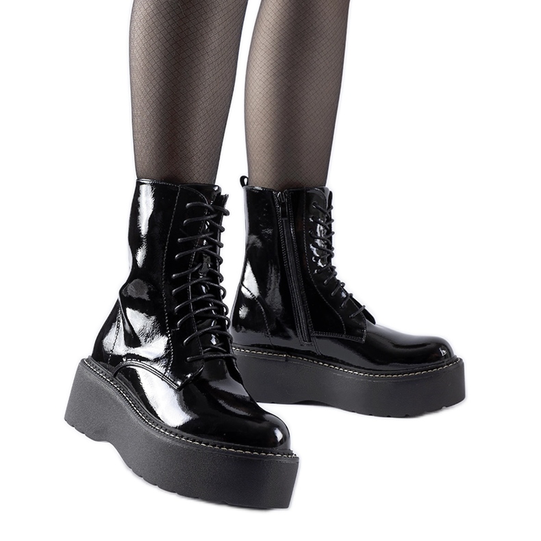 Crni patentni radnici na platformi Leos crno