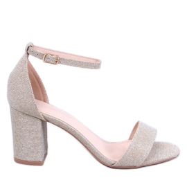 Yanas zlatne sandale s visokom petom u preljevima zlatni