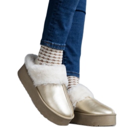 Zlatne platform papuče ukrašene krznom s elastičnom trakom na peti zlatni