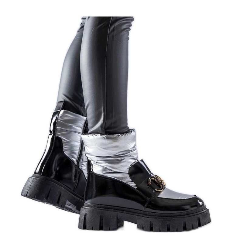 Crne i srebrne lakirane čizme za snijeg crno