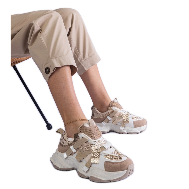 Bež tenisice sa zlatnim umetcima