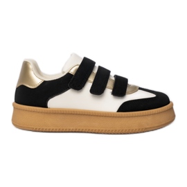 Ženske tenisice s metalnim crno -bijelim umetcima crna