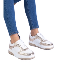 Zlatne tenisice na gustom potplatu zlatni