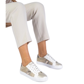 Zlatne tenisice sa životinjskim motivom ukrašenim sjajem zlatni