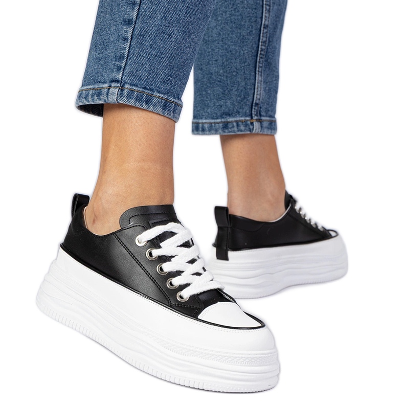 Crno -bijele ženske tenisice na visokom potplatu bijela