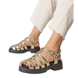 Zlatne sandale na platformi s izgrađenom linijom prsta zlatni