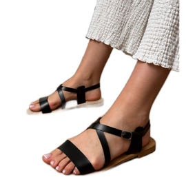 Crne ravne sandale s remenom crno