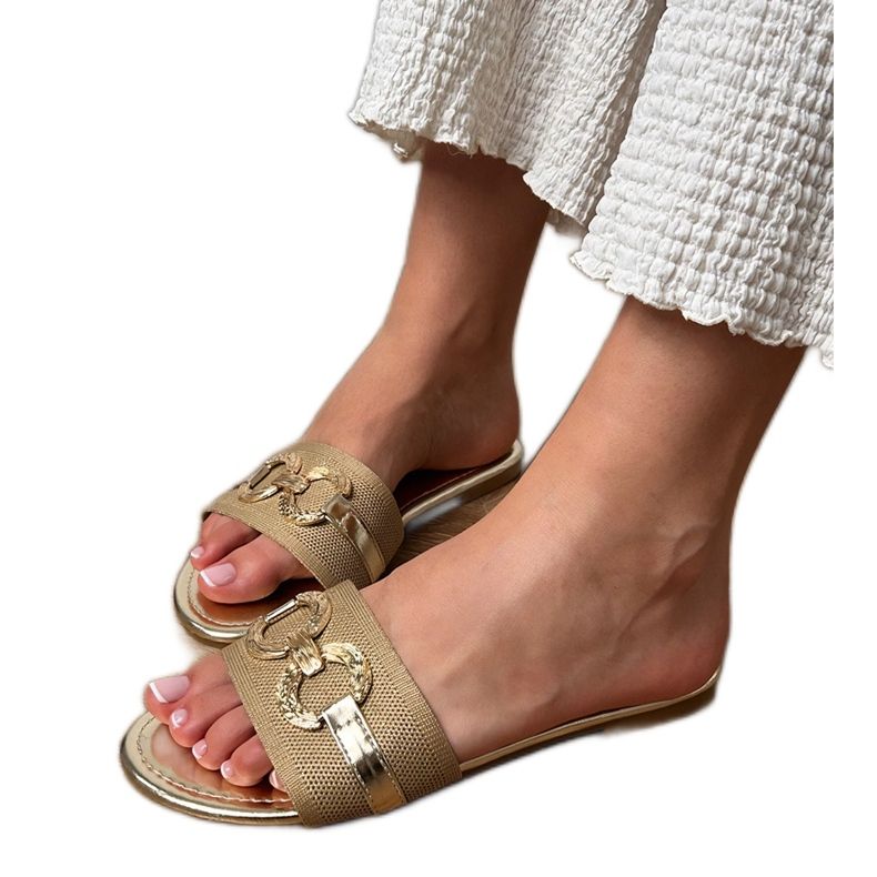 Zlatni prelepovi sa zlatnim ukrasom na pojasu zlatna