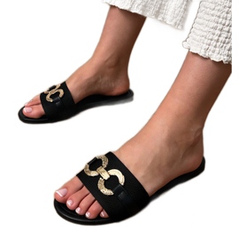 Crni okretni lepci sa zlatnim ukrasom na šanku crna