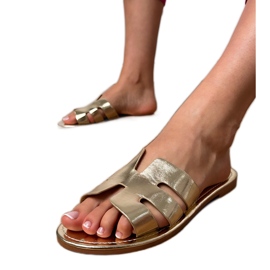 Golden Flip -flops ukrašen izrezima zlatni