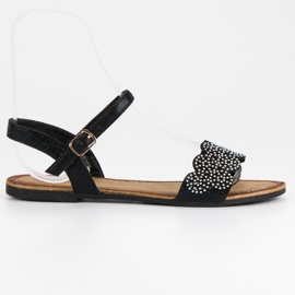 Comer Ravne sandale zakopčane kopčom crna