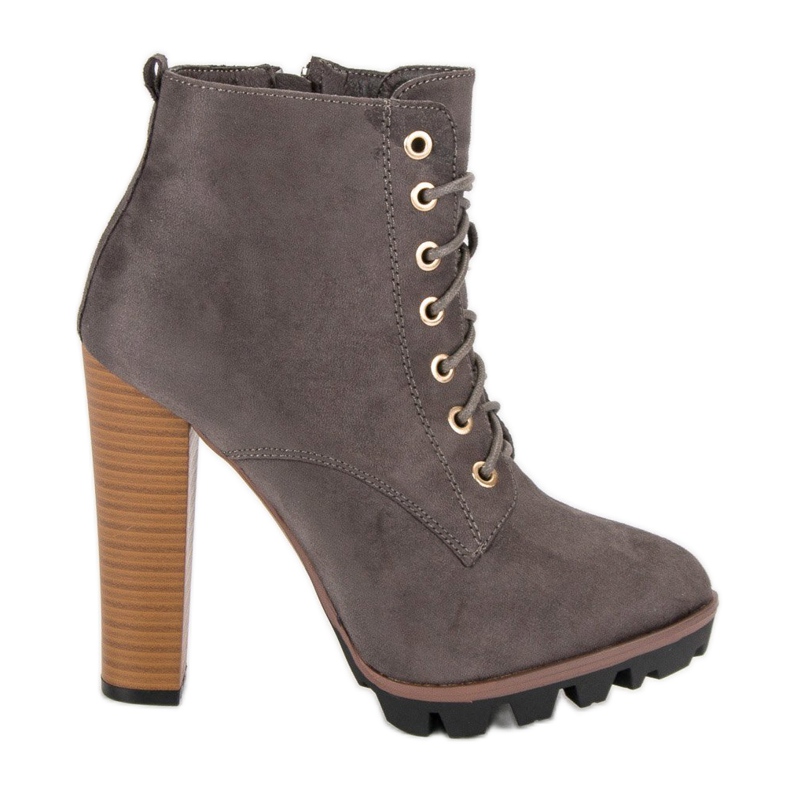 Sive zavezane čizme na stupu siva