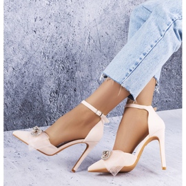 Bež igle s mašnom i kubičnim cirkonima iz Bussija 1