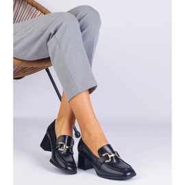 Crne pumpe na stanici metalnim ukrasom crno 1