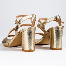 Elegantne ženske Shelovet zlatne sandale na stup crno 1