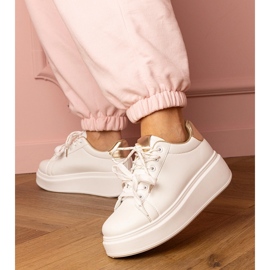 Bijele i zlatne sportske tenisice na platformi bijela 2