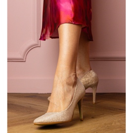 Pumpe šampanjca na brokatu zlatni 1