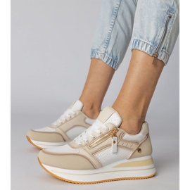 Bež sportske tenisice ukrašene klizačem 1