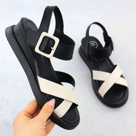 Ženske kožne sandale na klinovima crne i bež filippo ds6874 crno 1