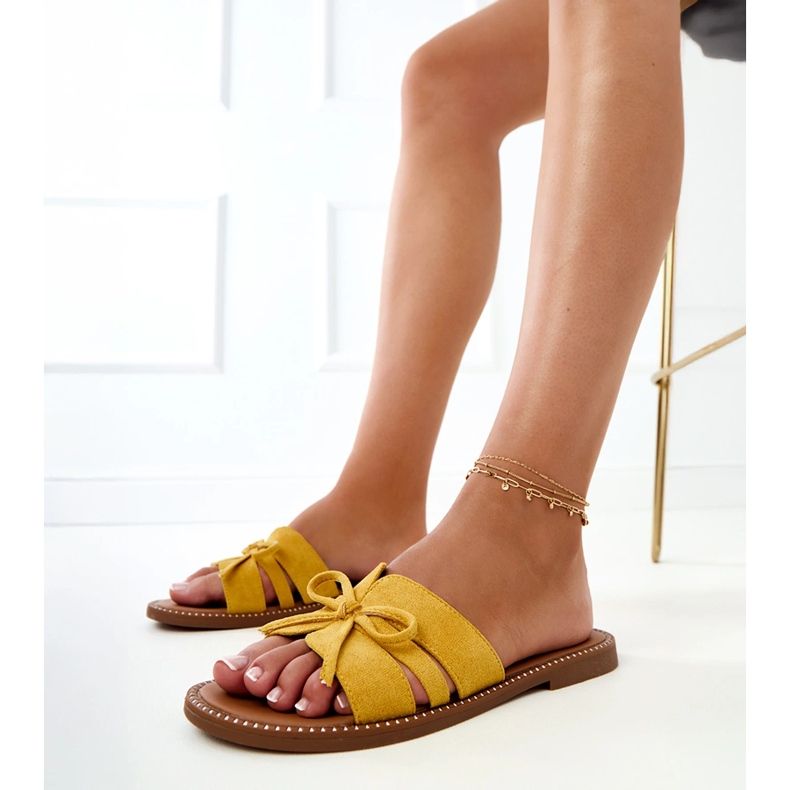 Žuti okretni lepci s lukom i ukrasom na rubovima žuta boja 1