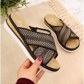 Crne ženske papuče na klin potpetice Rieker 679A5 bež smeđa 1