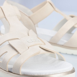 Udobne ženske natikače s elastičnom ecru Rieker V5052-80 bež 1