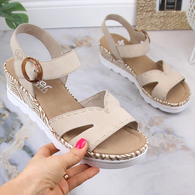 Udobne ženske sandale na wedge bež boje Rieker 67173-60 1