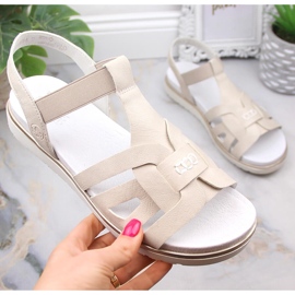 Udobne ženske natikače s elastičnom ecru Rieker V5052-80 bež 2