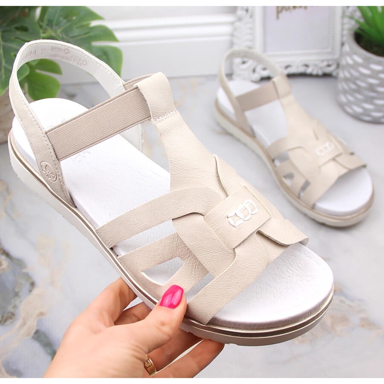 Udobne ženske natikače s elastičnom ecru Rieker V5052-80 bež 2